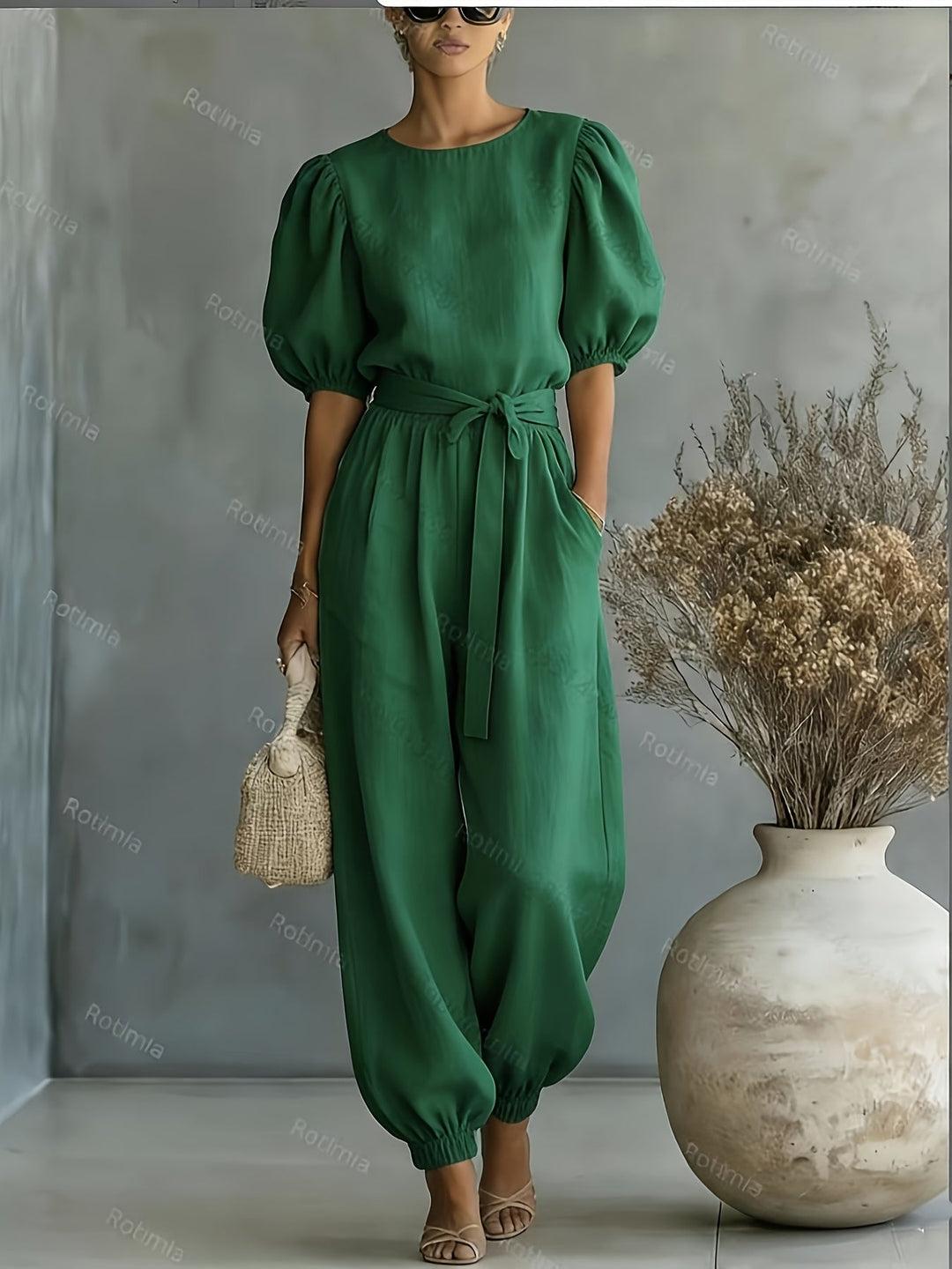 Bohemian-style Puff Sleeve Jumpsuit with Tie-waist. Features Side Pockets for Convenience, a Fit, and Comfortable Casual Wear