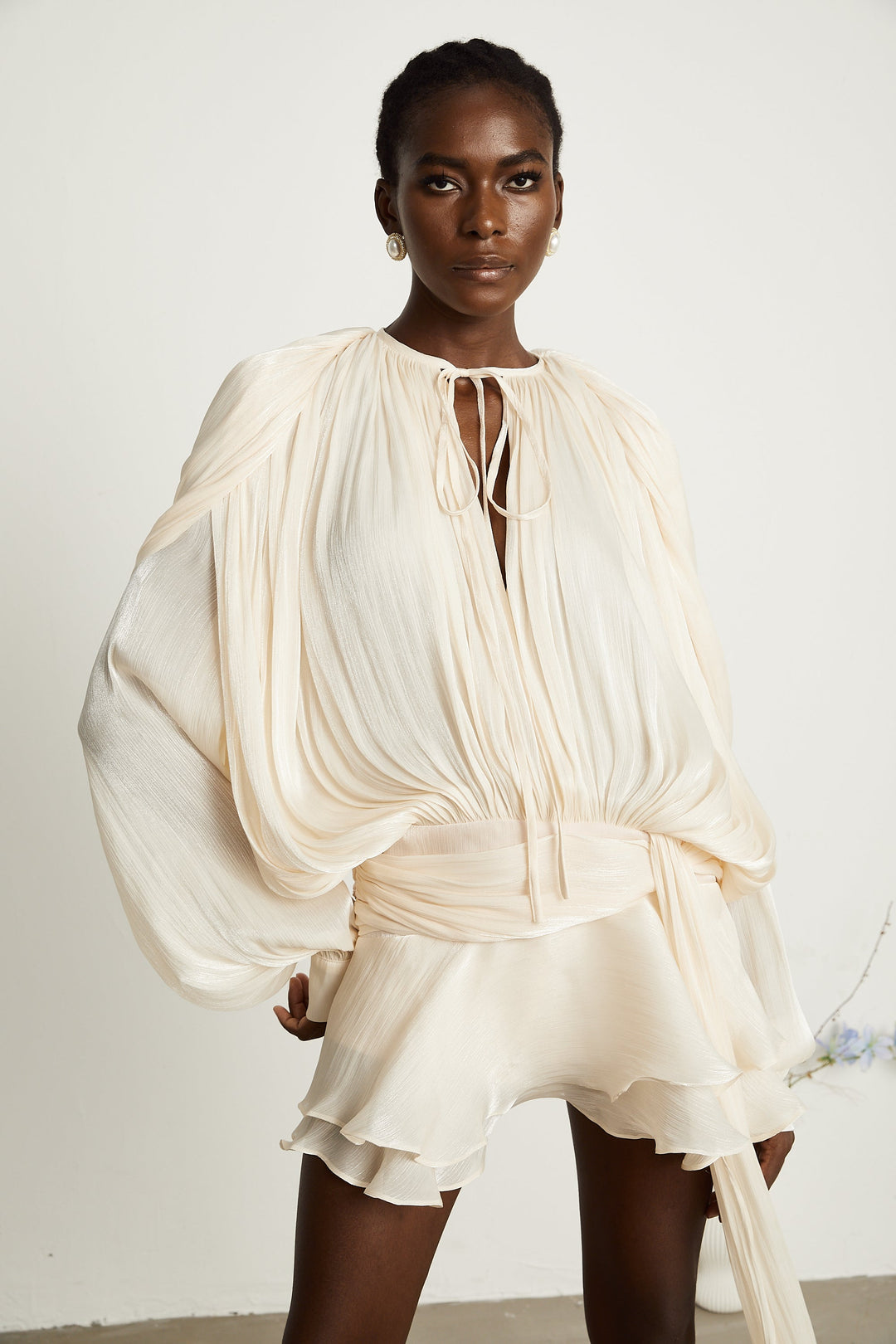 Eugénie fully-pleated ruffled mini dress in Neutrals