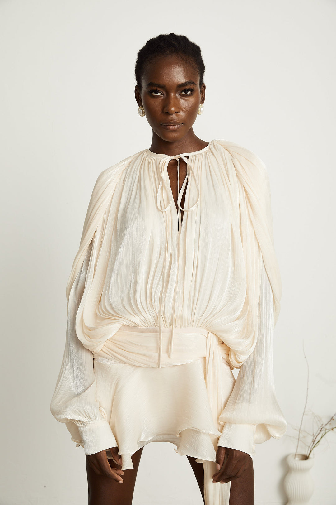 Eugénie fully-pleated ruffled mini dress in Neutrals – CELESTIA UAE