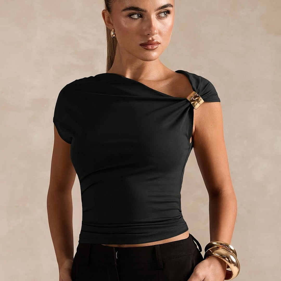 New Spring And Summer Fashion Features a Easy And Elegant Solid Color Top with Asymmetric Off-Shoulder Design And Metallic Accents for Women. This Stylish T-Shirt Is Tailored with a Solid Color And Asymmetric Neckline