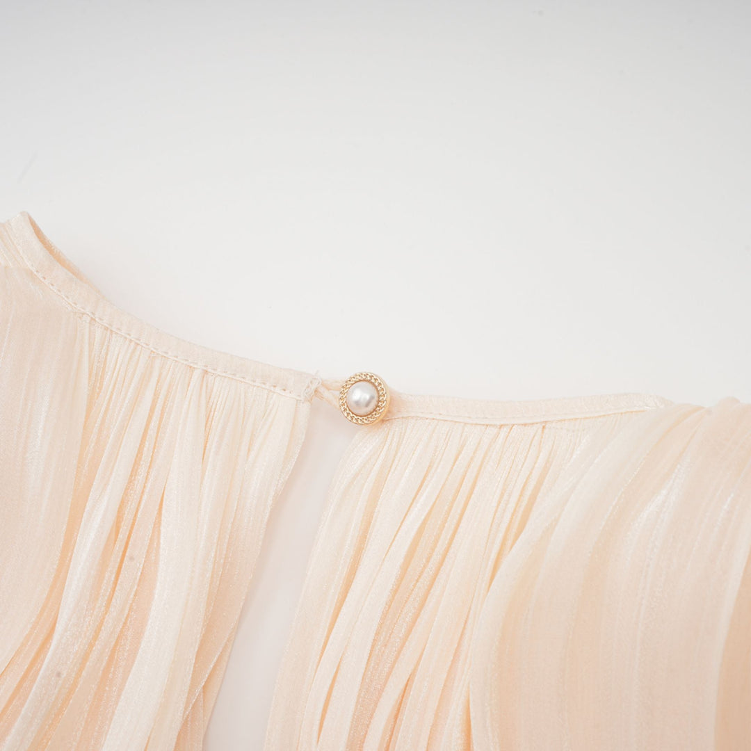 Eugénie fully-pleated ruffled mini dress in Neutrals